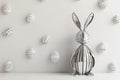 A modern, abstract Easter Bunny made of sleek metallic lines, standing in front of a minimalist Royalty Free Stock Photo