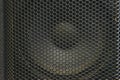 Modern acoustic systems. Metal grating on the sound dynamics. Royalty Free Stock Photo