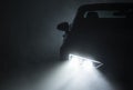 Modern Active Car LED Headlights Performing in Fog Royalty Free Stock Photo