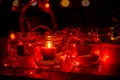 Modern advent wreath made of four glass jars, fake snow and red candles. Christmas decoration Royalty Free Stock Photo