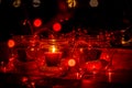 Modern advent wreath made of four glass jars, fake snow and red candles. Christmas decoration Royalty Free Stock Photo