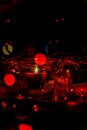 Modern advent wreath made of four glass jars, fake snow and red candles. Christmas decoration Royalty Free Stock Photo