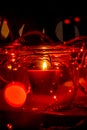 Modern advent wreath made of four glass jars, fake snow and red candles. Christmas decoration Royalty Free Stock Photo