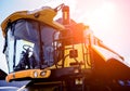 Modern agricultural machinery and equipment. Yellow agricultural harvester. Royalty Free Stock Photo