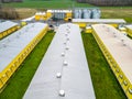 Modern agro-industrial complex top view. Flying a drone over a large chicken farm, raising broiler chickens for meat. Rows of Royalty Free Stock Photo