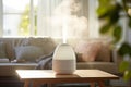 Modern air humidifier sitting on a table in living room Royalty Free Stock Photo