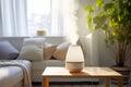 Modern air humidifier sitting on a table in living room Royalty Free Stock Photo