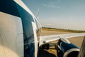 Modern aircraft wing and fuselage part landing taking off from m