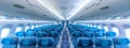 Modern airplane cabin interior with blue seats and spacious design Royalty Free Stock Photo