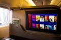 Modern airplane interiors, luxury first class and business class seats with entertainment area Royalty Free Stock Photo