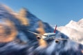 Modern airplane mith motion blur effect at sunny bright day. Lan Royalty Free Stock Photo