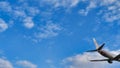 modern airplane tail side view isolated on blue sky part of passenger jet fuselage commercial airplane