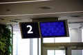 Modern airport departure gate waiting area with gate number Royalty Free Stock Photo