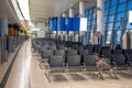 Modern airport terminal waiting room. Empty airport terminal waiting area. contemporary lounge with seats in the airport Royalty Free Stock Photo