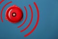 Modern alarm bell on color background