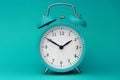 Modern alarm clock turquoise closeup object