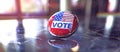 Modern American election badge with VOTE text and American flag design. Blurred background. Copy space. Concept of Royalty Free Stock Photo