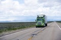 Modern American semi truck and reefer trailer on Nevada road