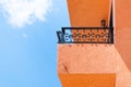 Modern apartment balcony ,balconies orange of hotel on sky background Royalty Free Stock Photo