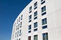 Modern apartment building with decorative grooved concrete facade