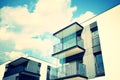 Modern apartment building exterior. Retro colors stylization Royalty Free Stock Photo