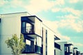 Modern apartment building exterior. Retro colors stylization Royalty Free Stock Photo