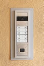 Modern apartment building intercom panel with camera, doorbell buttons Royalty Free Stock Photo