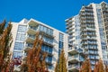 Modern apartment buildings exteriors in sunny day. Cityscape with facade of a modern housing construction with balconies Royalty Free Stock Photo