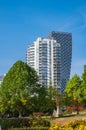 Modern apartment buildings exteriors in sunny day. Cityscape with facade of a modern housing construction with balconies Royalty Free Stock Photo