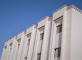 Modern apartment buildings exteriors under blue sky. Muscat, Oman. Royalty Free Stock Photo