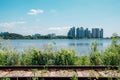 Modern apartment buildings and rail bike road at Wangsong Lake park in Uiwang, Korea Royalty Free Stock Photo