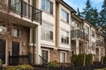 Modern apartment buildings on a sunny day with a blue sky. Facade of a modern apartment building. New apartment building Royalty Free Stock Photo