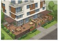 Modern apartment complex exterior with a spacious ground-level terrace. The design Royalty Free Stock Photo