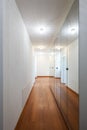 Long corridor with parquet and nobody the passage. Royalty Free Stock Photo