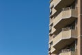 Modern apartment, hotel building on blue sky background from worm eyes view Royalty Free Stock Photo