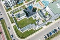 Modern apartment house with green grass floor on flat roof. drone photo Royalty Free Stock Photo