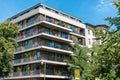 Modern apartment house with some green trees Royalty Free Stock Photo