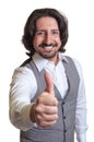 Modern arabian man showing thumb up