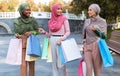 Modern Arabic Ladies On Shopping Carrying Shopper Bags Walking Outdoor Royalty Free Stock Photo