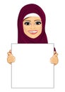 Modern arabic woman wearing hijab holding empty blank board