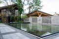 Reflective Water Feature with Decorative Concrete Block Wall and Pavilion Royalty Free Stock Photo