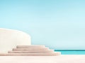 Modern architectural steps leading to tranquil waters under a clear blue sky Royalty Free Stock Photo