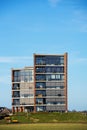 Modern architecture apartment complex building with balconys with clear blue sky