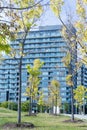 Modern architecture apartment complex park trees Royalty Free Stock Photo