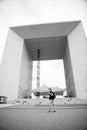 Modern architecture. Backpacker exploring city. Summer vacation. Woman stand in front of urban architecture. Must visit