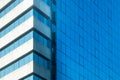Modern architecture close up with mirror window of building in Bangkok Royalty Free Stock Photo