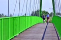 Green bridge  for bikers and pedestrians over Poprad river, Stary Sacz, Poland Royalty Free Stock Photo