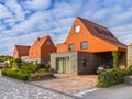 Modern architecture houses with red roof tiles