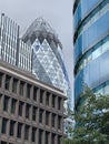 Modern architecture near Aldgate East London with the Gerkin tower