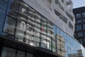 Modern architecture street in paris batignolles france mirror reflections of the building glass facade